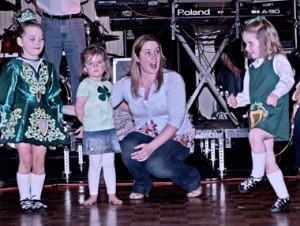 The littlest dancers get some one-on-one coaching. 