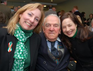 Knute Bonner gets a double hug from the McCafferty girls, Bridie and Peggy, at the CBS 3 pre-parade party. 