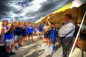 Woo-hoo! The Notre Dames cheer their trophy. Photo by Eileen McElroy.