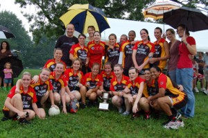 The Mairead Farrells posing with their hard-won cup.