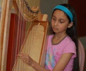 Mina Hauth, 11, took first in under-12 harp.