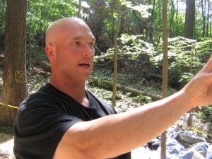 Professor Earl Schandelmeier directs the investigation at the Duffy's Cut site.