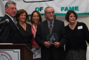 From left, the evening's emcee Tom Farrelly, Carmel Boyce, Ann Donofry's daughter, Jeannine, husband Frank, and Hall of Fame President Kathy McGee Burns. 