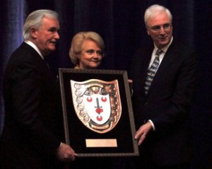 John and Joan Mullen accept the Taoiseach's Award from Irish Ambassador Michael Collins. 