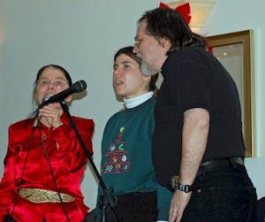 Kathy, Emma and Dennis harmonize at a recent Christmas Wren party.