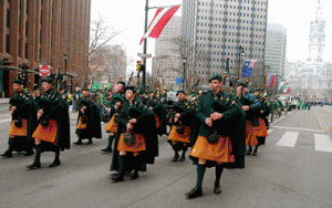 The Emerald Pipe Band marches up the Parkway.