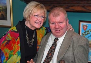 Mayo president Maureen Brett Saxon embraces her nephew and godson Christopher Brett.