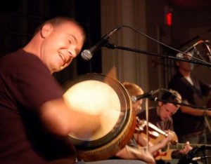 Lunasa's Kevin Crawford gets crazy with his bodhran.