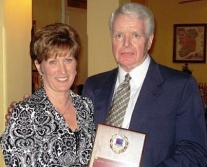 Virginia Coyne Brett, president of the Philadelphia Galway Society, presents the 2008 Person of the Year Award to Drew Monaghan. 