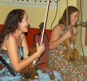 The sisters share a laugh.