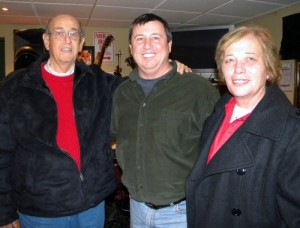 Jim Dougherty, parade chairman Jim Gallagher, and Doc's wife Jane.