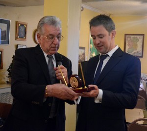 The Irish Center's Tom Farrelly (no relation) presents a token of recognition to outgoing New York Irish Vice Consul Alan Farrelly.