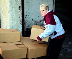 Mary Patrick loads up the truck.