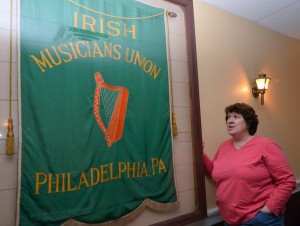 Mary Lou McGurk with the Irish Musicians Union banner.