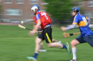 Na Toraidhe hurlers in motion