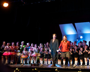 John Byrne and Kim Killen taking their bows with the Celtic Flame dancers.