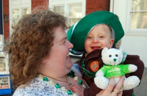 One happy baby enjoys the parade.