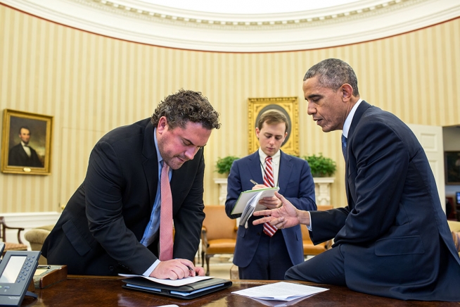 President Obama preparing his address with speechwriters