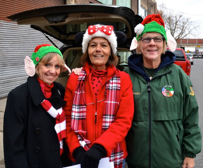 Annie Washart, Barbara MacReady and Ellen McCue get into the festive spirit.