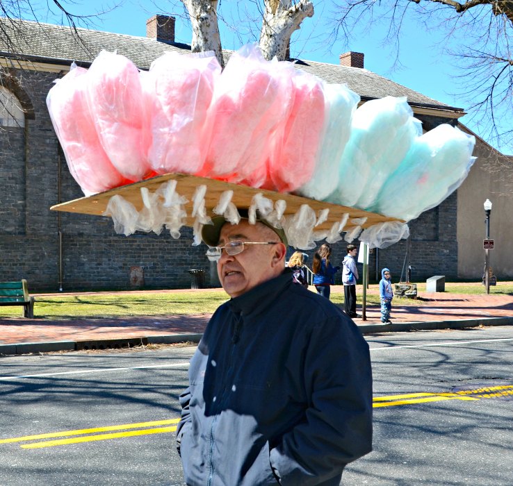 After eight years selling cotton candy, this vendor has perfected his sense of balance.