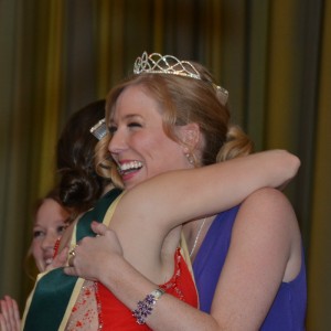 2014 Mary from Dungloe Kelly Devine accepts hugs from friend and 2013 Mary, Moira Cahill.